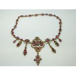 An Austro-Hungarian necklace set with pink tourmaline and seed pearls