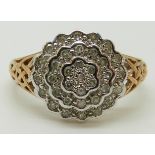 A 9ct gold ring set diamonds in a flower cluster, total diamond weight approximately 0.25ct, 2.