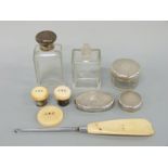A quantity of Art Deco hallmarked and ivory dressing table items including some loose lids etc.