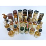 A collection of whisky miniatures, some single malts to include Bowmore, Glenmorangie, Lagavulin,