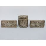 A set of three Burmese or Indian white metal boxes comprising circular example,