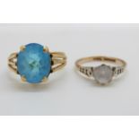 An 18ct gold ring set with a blue topaz and a 9ct gold ring set with paste (size K and M/N)