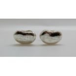 A Tiffany & Co pair of silver cufflinks in the form of coffee beans, signed Elsa Pereth,