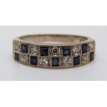 An 18ct white gold ring set with square sapphires and alternating diamonds (size M)