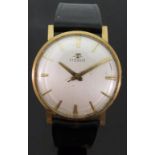 Tissot 9ct gold gentleman's wristwatch with gold hands and baton markers and silvered face,