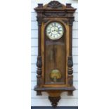 A late 19th / early 20thC Vienna regulator two train wall clock with brass weights,