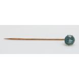 A Victorian stick pin set with a zircon, 5.5cm long,(zircon 0.8cm),1.