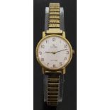 Omega De Ville gold plated ladies wristwatch with Arabic numerals and white face,