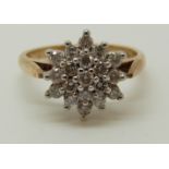 A 9ct gold ring set with diamonds in a cluster, total diamond weight approximately 0.5ct, 2.