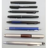 Seven Lamy pens comprising two fountain pens,