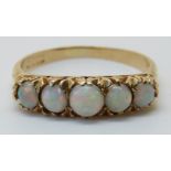 An 18ct gold ring set with five opals (size V)