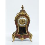 A mid to late 19thC Louis XIV style boulle work mantel clock with ormulu mounts,