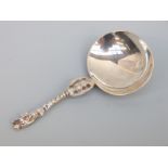 A Victorian hallmarked silver tea caddy spoon with apostle finial,