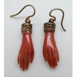 A pair of Victorian earrings in the form of hands