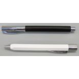 Two Faber Castell pens Ambition fountain pen with black ash barrel chrome cap,