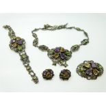 A suite of silver Arts & Crafts suffragette jewellery by Zoltan White & Company set with purple,