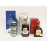 Three bottles of alcohol comprising Ron Quorhum rum 70cl 40%,