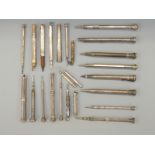 Approximately 24 hallmarked silver and white metal propelling pencils including Butler,