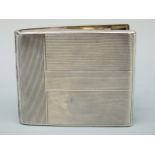 An Art Deco white metal cigarette case marked 925,