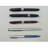 Five Sheaffer White Dot pens and pencils comprising stainless steel fountain pen,