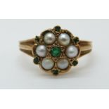 A 9ct gold ring set with pearls and emeralds (size P)