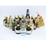 Approximately 40 alcohol miniatures to include Drambuie, Dufftown Glenlivet whisky, Sambuca,