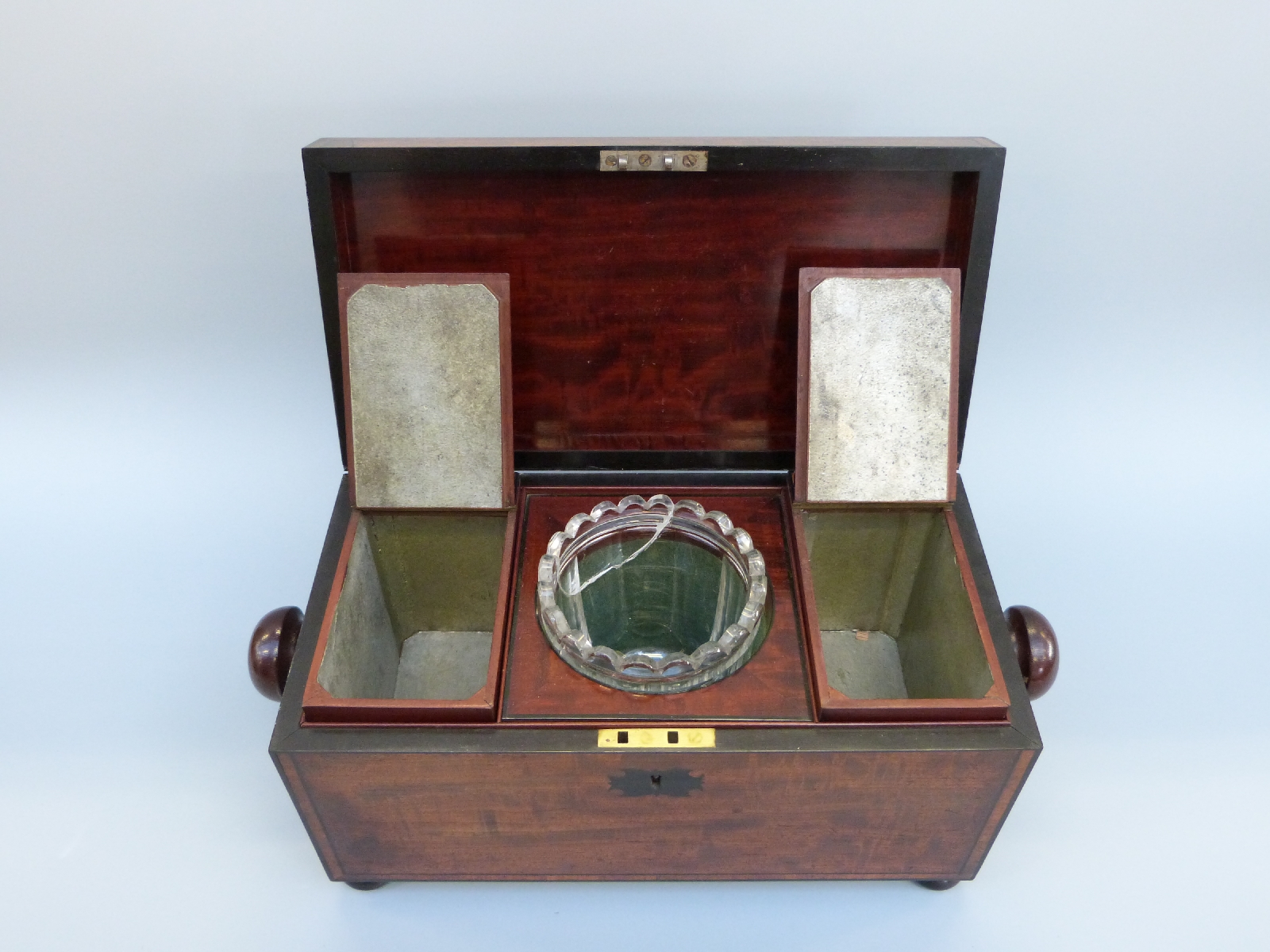 An early 19thC mahogany tea caddy of rectangular form with inlaid ebony detail, raised on bun feet, - Image 3 of 8