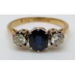 An 18ct gold ring set with a sapphire of approximately 0.
