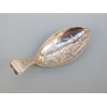 A George III hallmarked silver tea caddy spoon, Birmingham 1808 maker William Pugh,