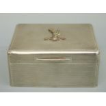 A George V hallmarked silver engine turned Royal Signals interest cigarette box,