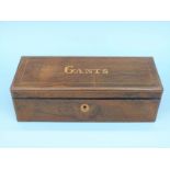 A 19thC French inlaid rosewood glove box with hinged lid and fall flap,