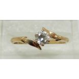 A 9ct gold ring set with a round cut cubic zirconia (size N)