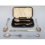 A cased hallmarked silver fork and spoon set and three further hallmarked silver spoons, weight 82g,