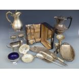 A large quantity of silver plated ware including tankard, salts, tazza, cutlery,