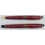 Waterman Phileas fountain and ballpoint pen set with red marbled barrel and caps,