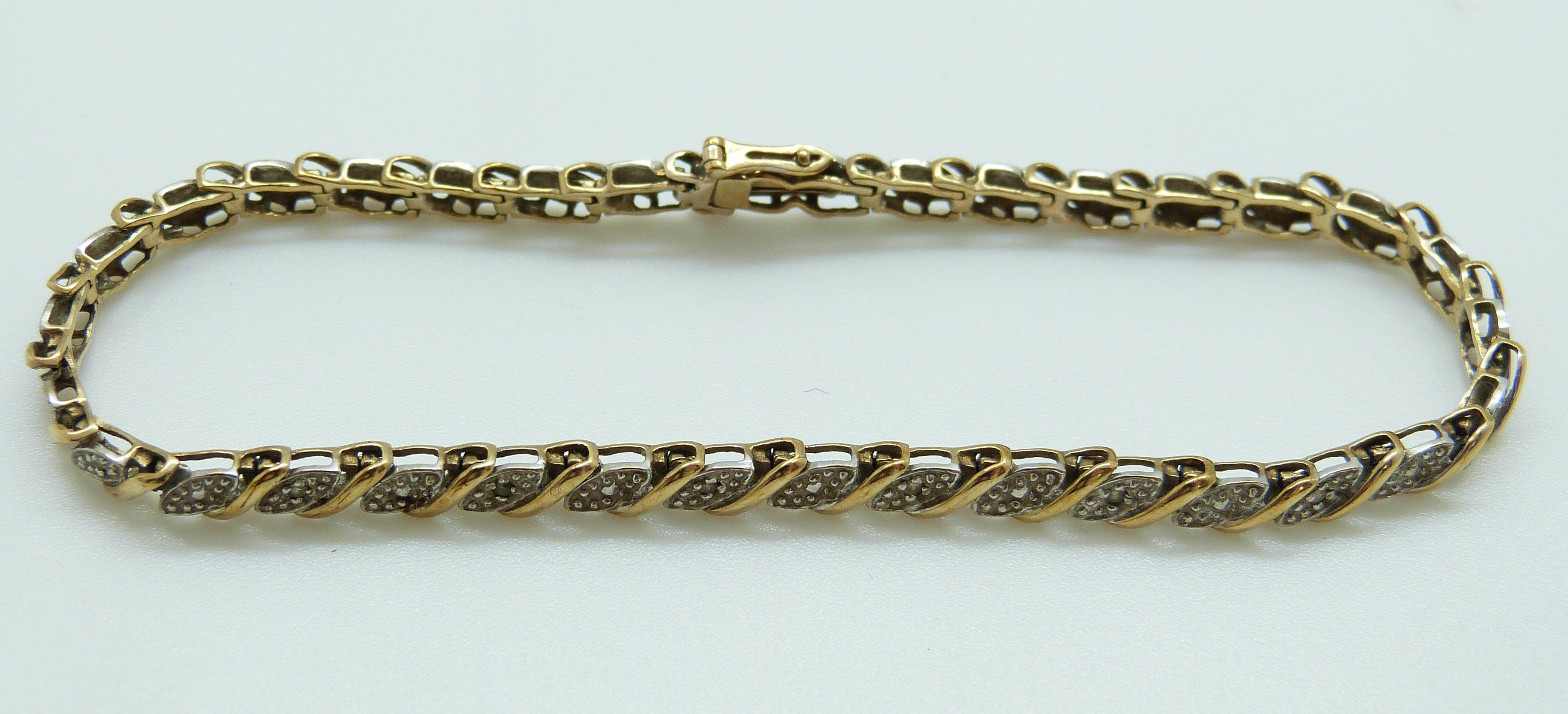 A 9ct gold bracelet set with diamonds, 7. - Image 3 of 4