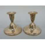 A pair of hallmarked silver squat candlesticks, Birmingham 1960 maker Adie Brothers Ltd, height 8.