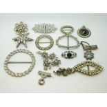 A collection of paste brooches including Victorian examples
