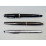 Three various Cross fountain pens.