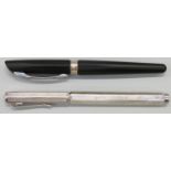 Two Caran d'Ache fountain pens Dunas with matte black barrel and cap,