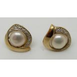 A pair of 9ct gold earrings set with pearls and diamonds