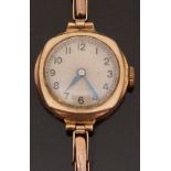 9ct gold ladies wristwatch with blued hands and Arabic numerals, on 9ct gold expanding bracelet,