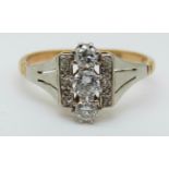 An 18ct gold ring set with diamonds in a platinum setting (size N)