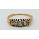An 18ct gold ring set with five old cut diamonds (size M)