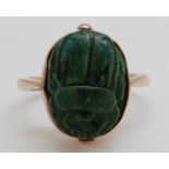 A yellow metal Victorian ring set with a carved scarab beetle, 4.