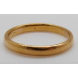 A 22ct gold wedding band, 4.