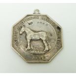 A hallmarked silver medallion for the London Carthorse Parade Society 1935, 3.5 x 3.