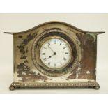 A French silver plated mantel clock with Roman white dial and Arabic quarters, raised on bun feet,