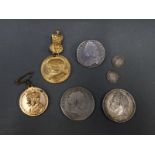 George II half crown brooch, together with two George II crowns,