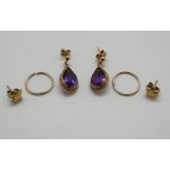 A pair of 9ct gold earrings set with amethysts and a pair of 9ct gold studs, 4.